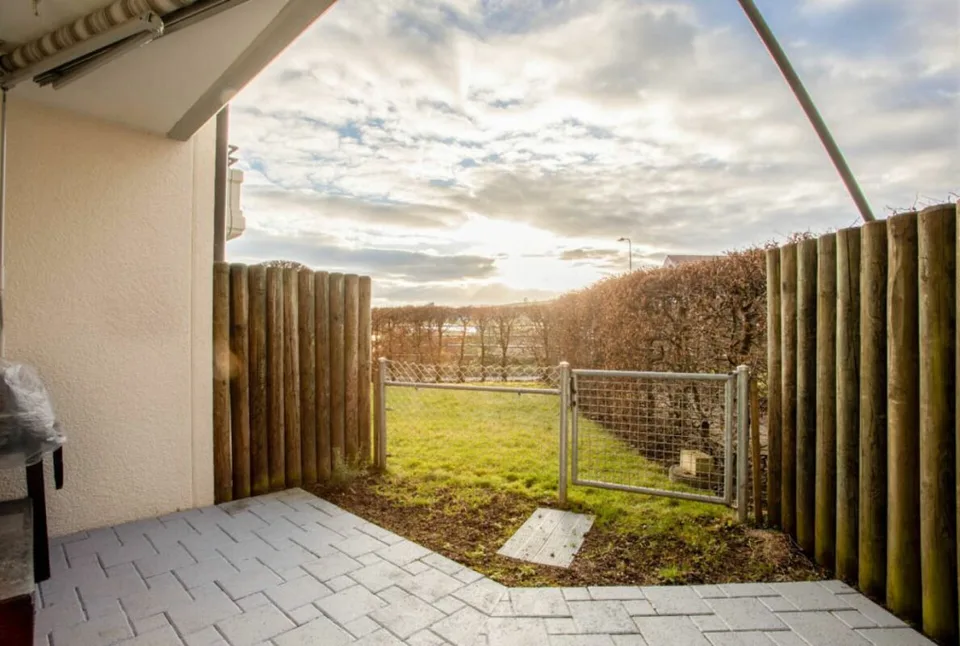 Appartement avec jardin dans un immeuble familial