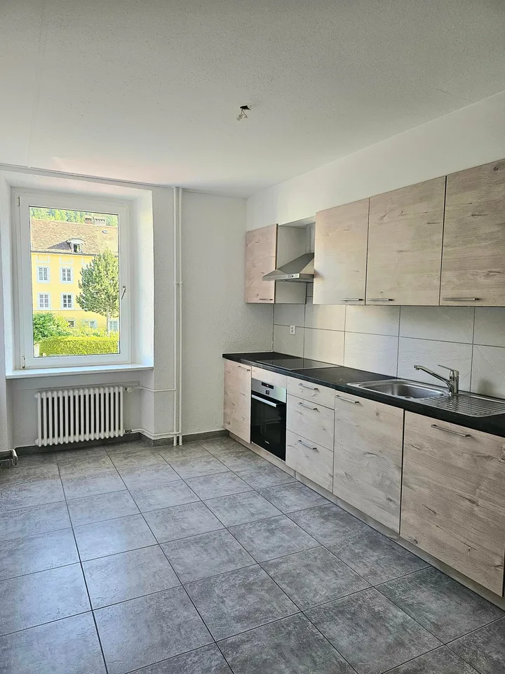 Appartement rénové de 4 pièces au centre du village
