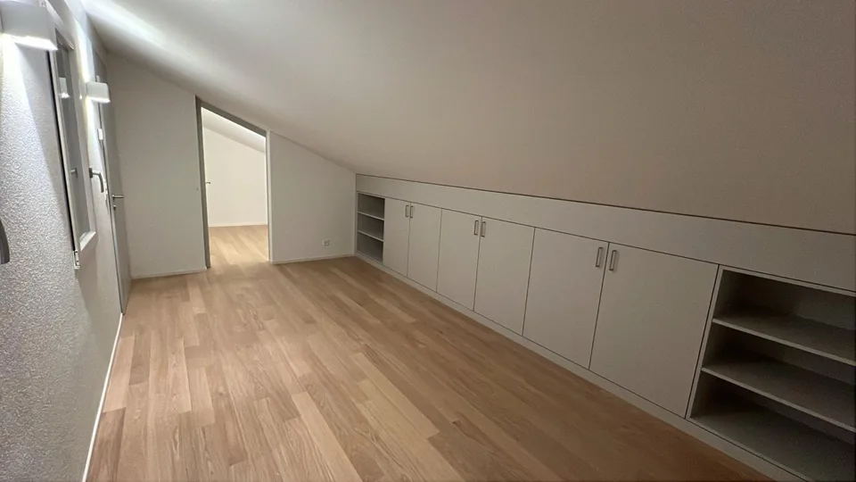 Modern attic apartment in a green area