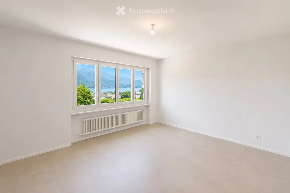 Appartement à louer de 4,5 pièces, 130 m², avec jardin privé et vue lac spectaculaire à Massagno