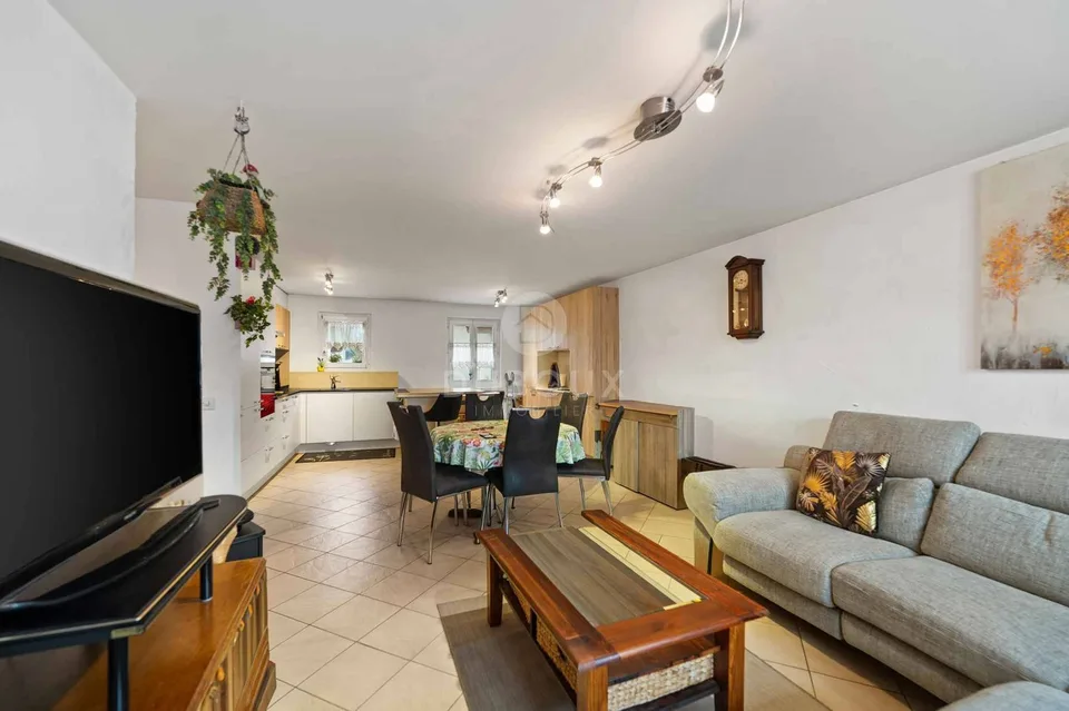 Incantevole duplex di 3 locali con orto