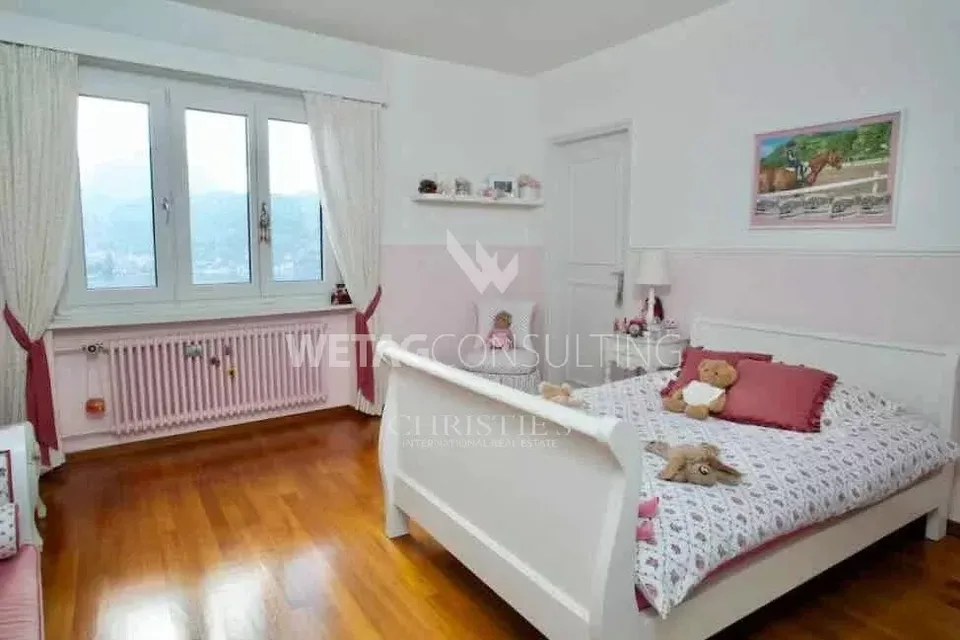 Lugano-Figino: Elegante Villa mit traumhafter Aussicht auf den Luganersee & Indoor-Pool zu verkaufen – Foto 8 von 12