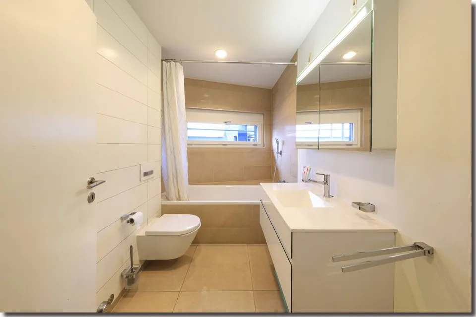 Moderno ed elegante appartamento di 4 locali con terrazza orientata a sud – Foto 14 von 18