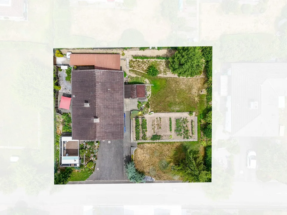 Baulandparzelle mit bestehendem Einfamilienhaus