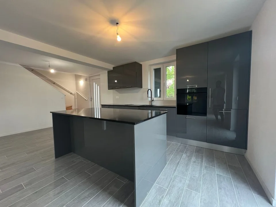 New triplex with 4.5 rooms / 3 bedrooms / 2 bathrooms / balcony / private garden