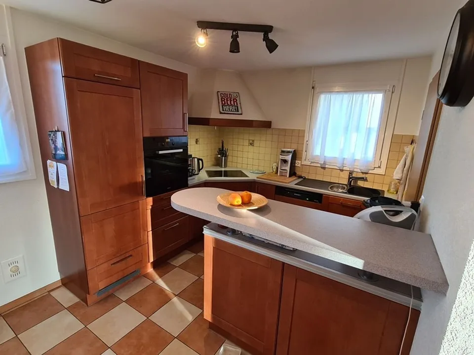 Appartement en attique avec  terrasse, garage double et place de parc extérieure
