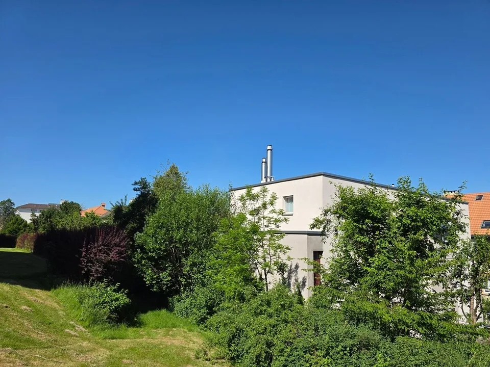 Appartement en attique avec  terrasse, garage double et place de parc extérieure