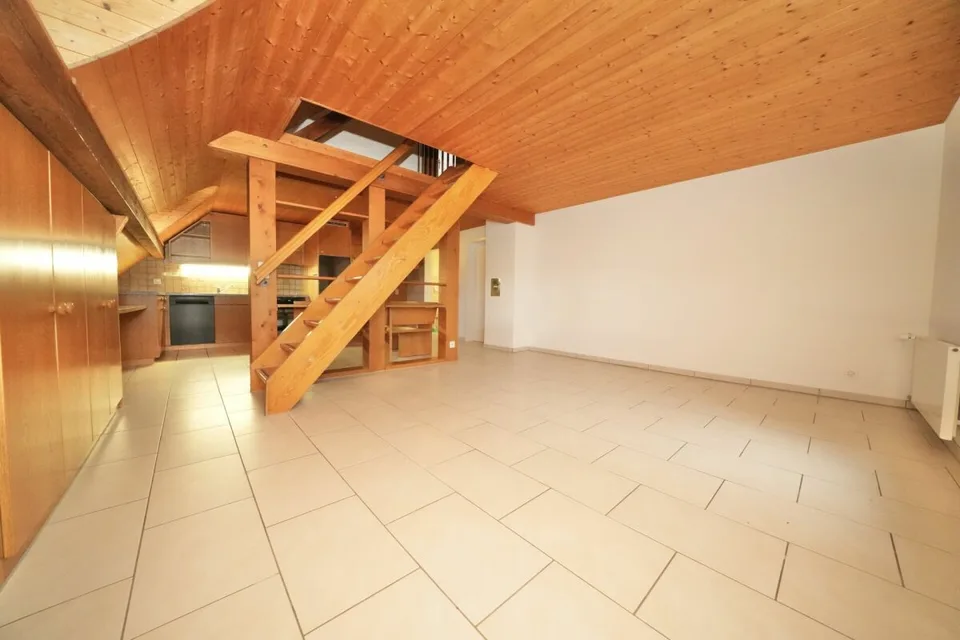 Appartement mansardé charmant dans un emplacement central