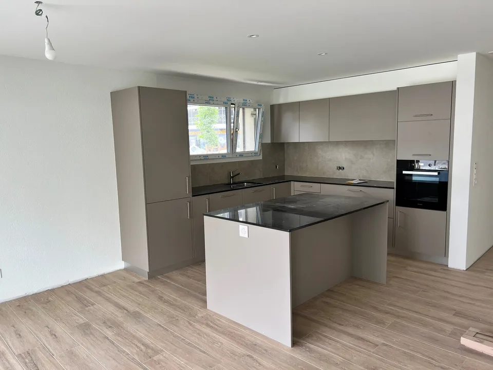Appartement de 4,5 pièces au rez-de-chaussée - avec terrasse et jardin