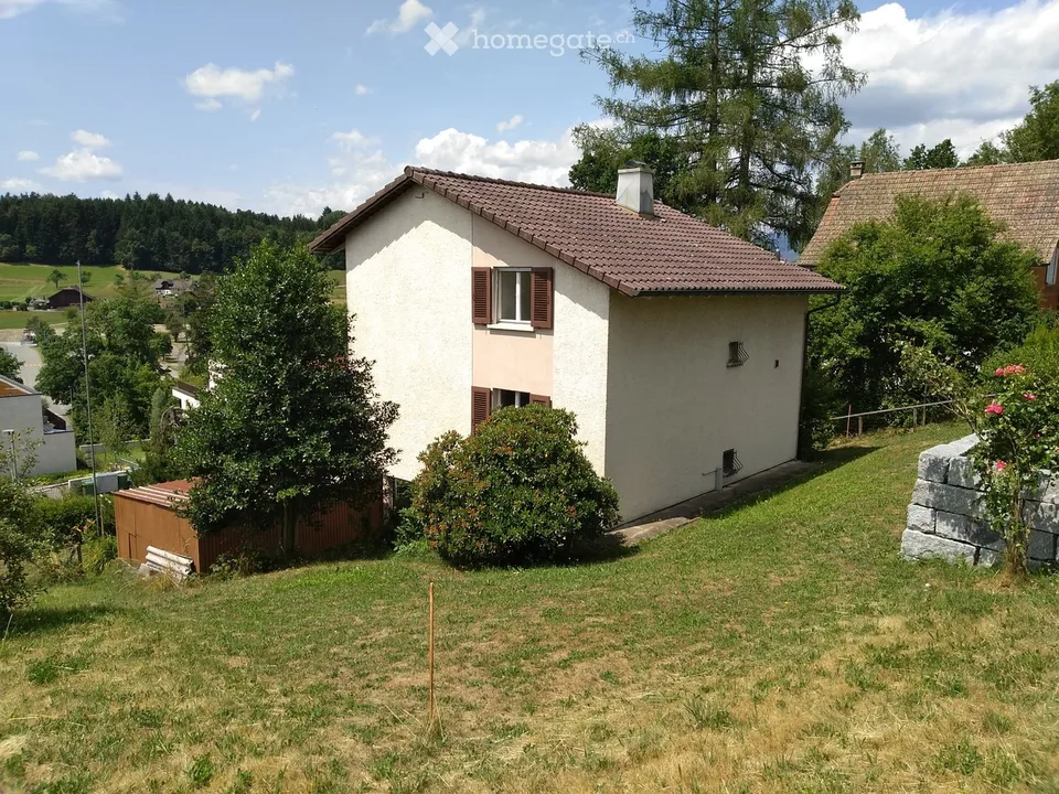 Terreno con casa unifamiliare a sé stante