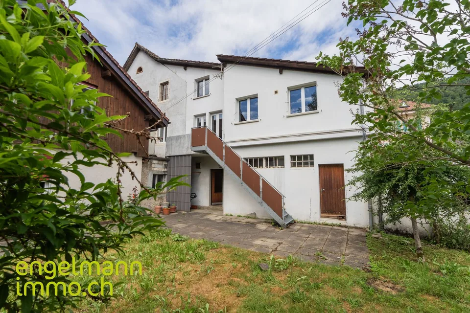 Immeuble de 2 appartements + surface commerciale / 2-Familienhaus mit Geschäftsfläche