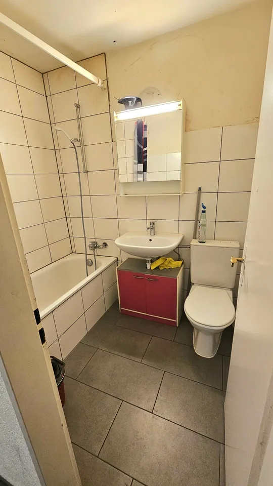 Emplacement central privilégié : Maison multifamiliale avec 7 appartements et restaurant – photo 6 sur 10