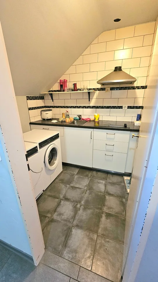 Zentrale Bestlage: Mehrfamilienhaus mit 7 Wohnungen und Restaurant