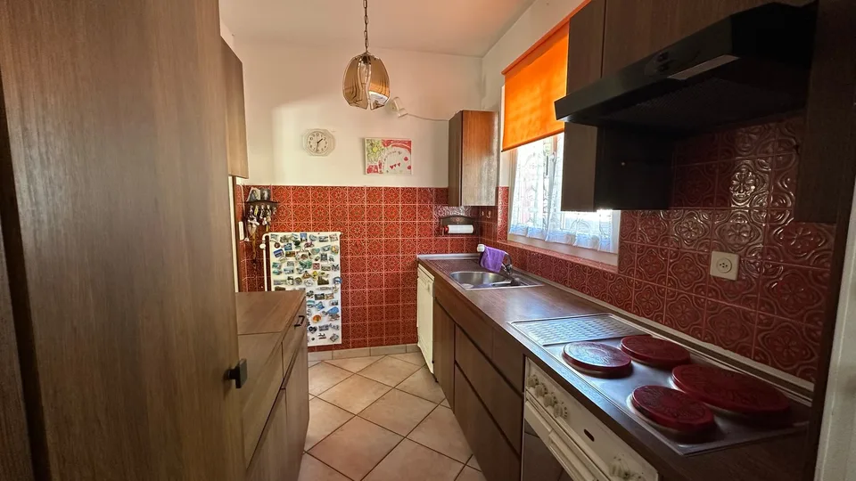 Casa bifamiliare con giardino