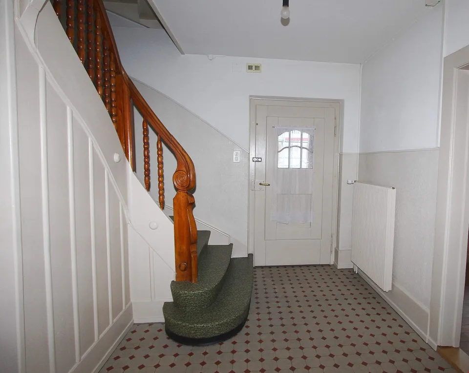 GRANDE MAISON UNIFAMILIALE OU BIFAMILIALE EN CENTRE-VILLE