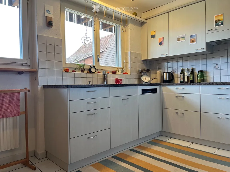 Grosszügige 4.5-Zimmer-Wohnung mit Balkon und Garten