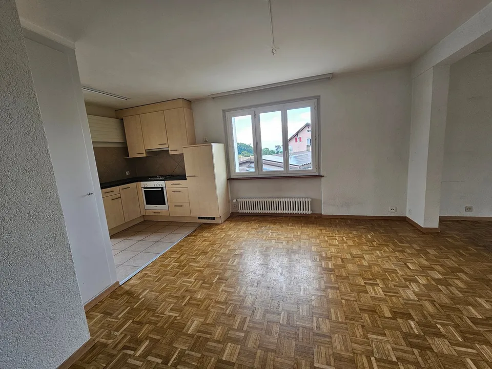 Appartement 4 pièces avec balcons et garage à Val-de-Ruz