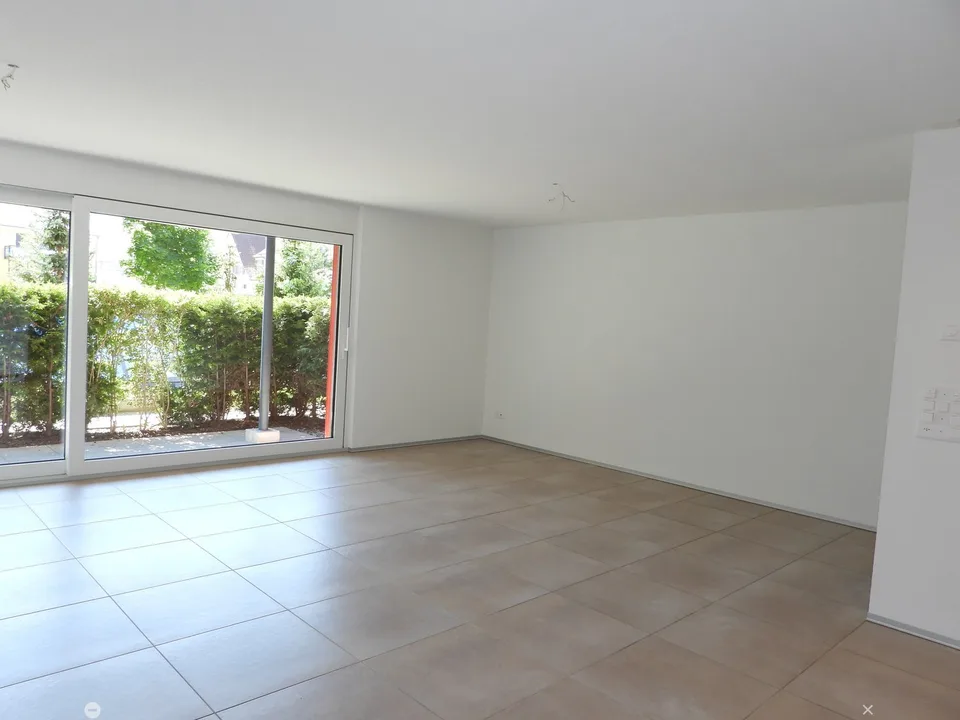 Moderne 3.5 Zimmerwohnung mit Gartensitzplatz