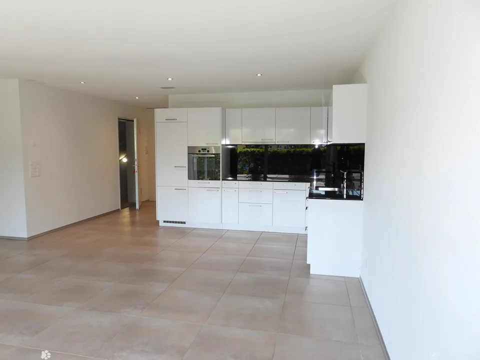 Moderne 3.5 Zimmerwohnung mit Gartensitzplatz