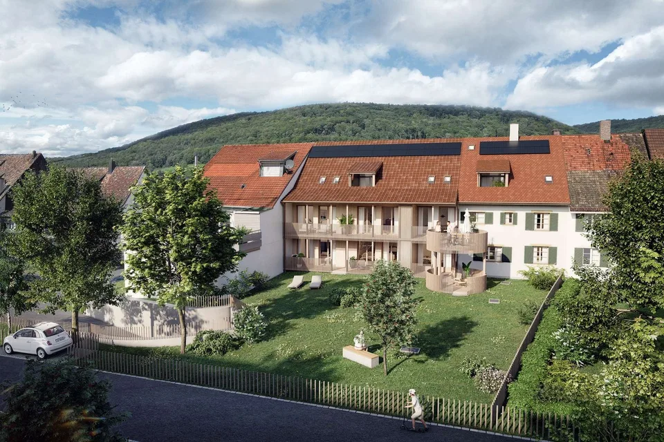 À Zinggen : Le charme de l'ancien bâtiment rencontre la qualité de vie moderne.