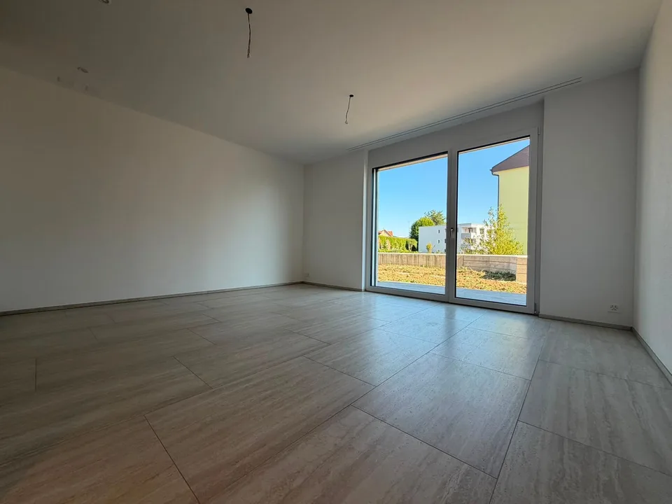 Appartamento 2.5 locali moderno in zona tranquilla a Bettwiesen - Disponibile immediatamente!