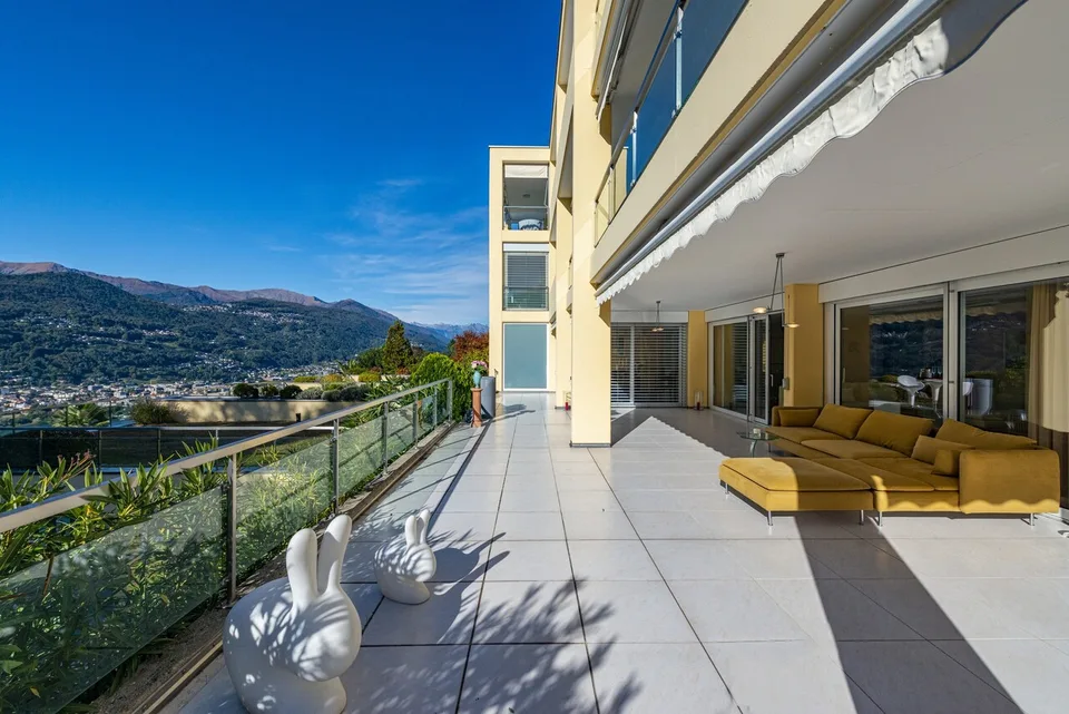 Elegante appartamento con giardino e vista lago, a due passi dal TASIS