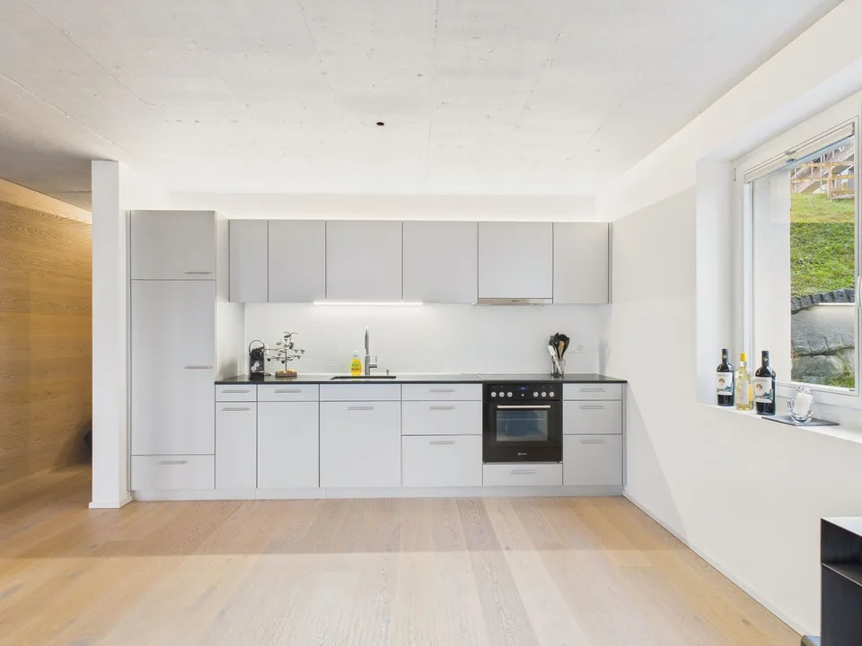 Moderne 2.5 Zimmer Wohnung mit grosszügigem Gartensitzplatz in Vattiz - der perfekte Zweitwohnsitz im Val Lumnezia