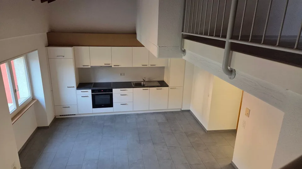 Logement en duplex situé entre le centre-ville et la gare CFF