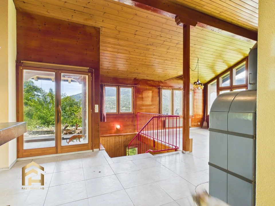 Au-dessus des toits de Ried-Brig : maison individuelle avec jardin d'hiver, sauna & vue panoramique