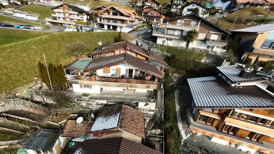 Mehrfamilienhaus mit atemberaubendem Bergblick in Merligen