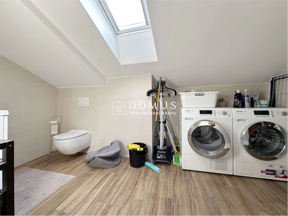 Dachgeschoß-Duplex im pulsierenden Herzen der Stadt – Foto 13 von 13