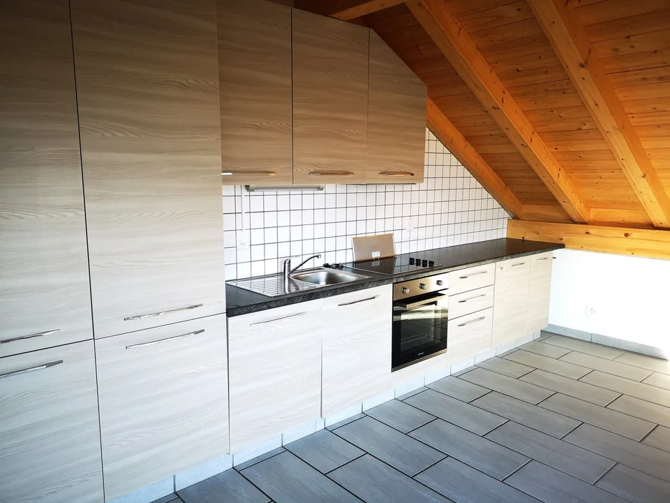 Appartement de charme 4.5 pièces sous les combles avec vue panoramique