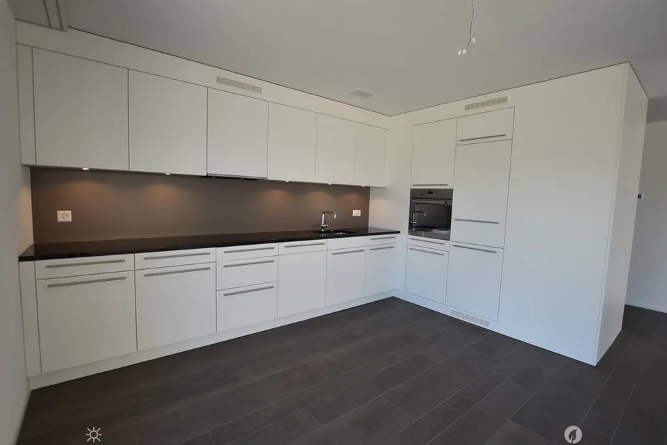 Moderne Erdgeschosswohnung mit Gartensitzplatz