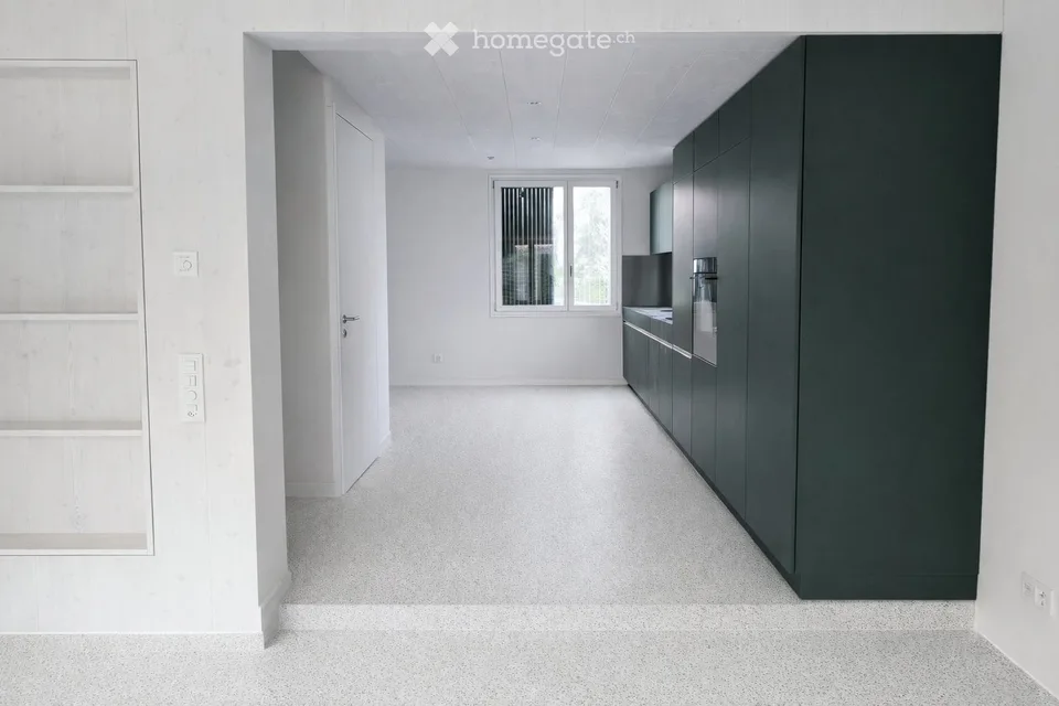 Premier location d'un appartement 4.5 pièces dans une maison jumelée avec jardin