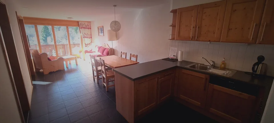 Beautiful furnished apartment with 3.5 rooms of 69.66 m2 + parking space in garage, cellar and ski locker