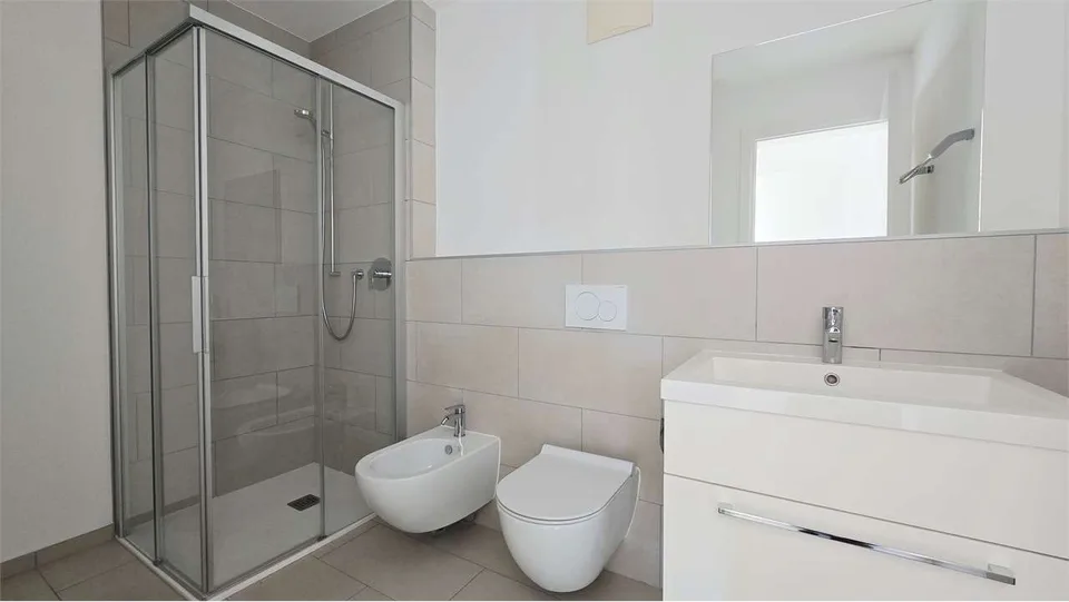 Moderno appartamento di 2.5 locali con terrazza e giardino - Vernate