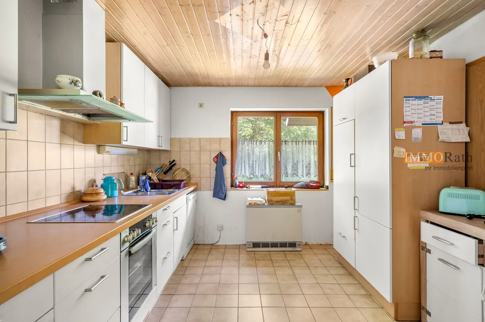 IMMORath.de Casa a due famiglie in posizione naturale con ampio spazio verde