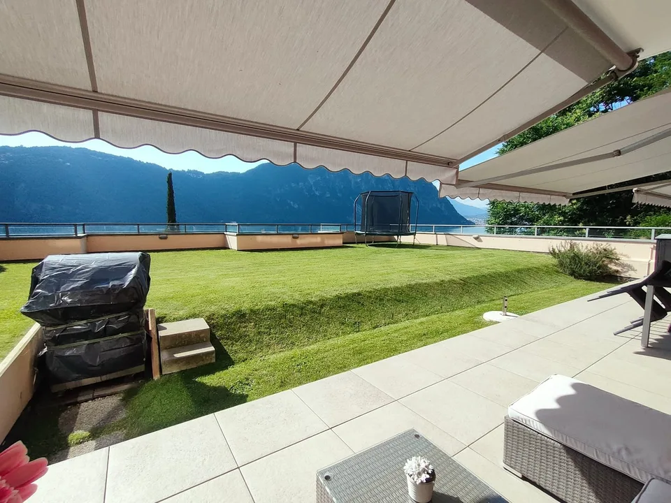 Bissone -  Esclusivo appartamento con giardino e vista mozzafiato sul Lago di Lugano