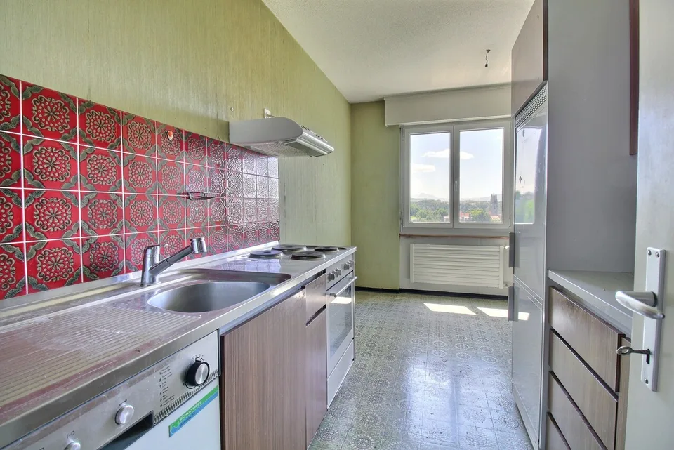 Spacieux appartement familial avec beau potentiel