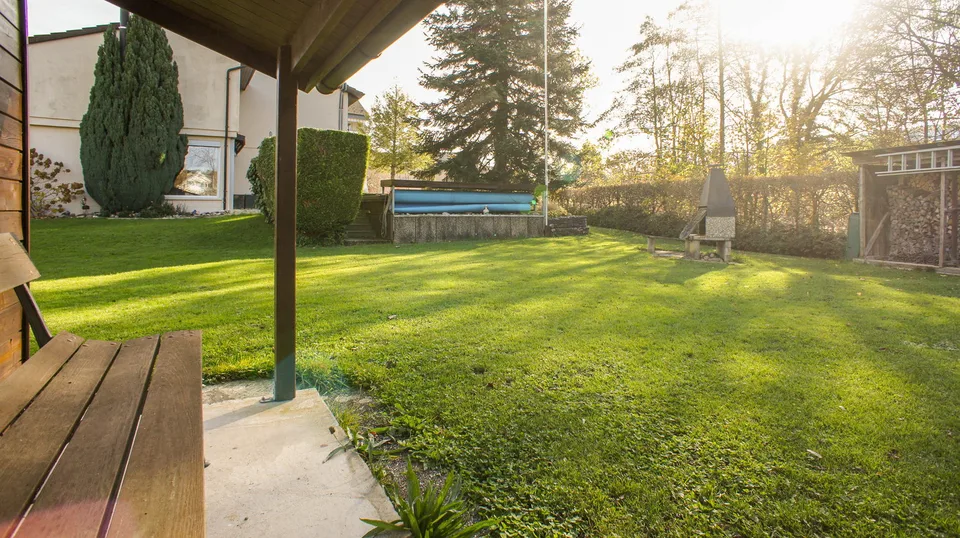 Terreno con casa unifamiliare