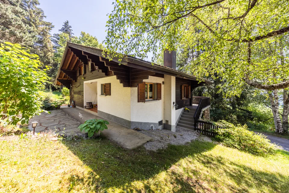 Chalet dans un écrin de verdure : situation et terrain d'exception