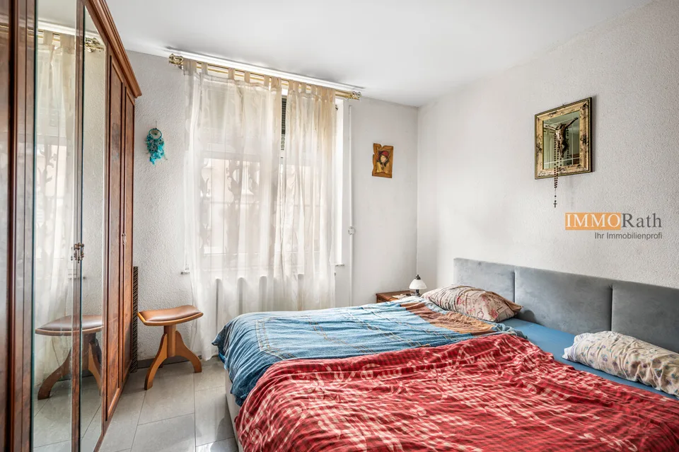 IMMORath.de - 4-Zimmerwohnung mit zwei Garagen – Foto 6 von 13
