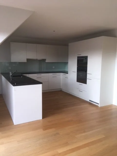 Bella appartamento di 4,5 locali mansardato con balcone