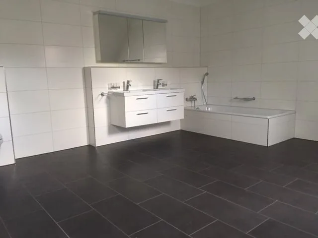 Bella appartamento di 4,5 locali mansardato con balcone