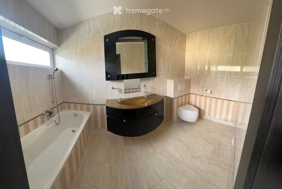 Appartement de 5.5 pièces en rez