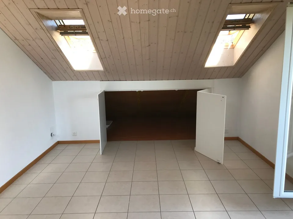 Charmant studio de 1.5 pièces avec vue panoramique à Chézard-Saint-Martin
