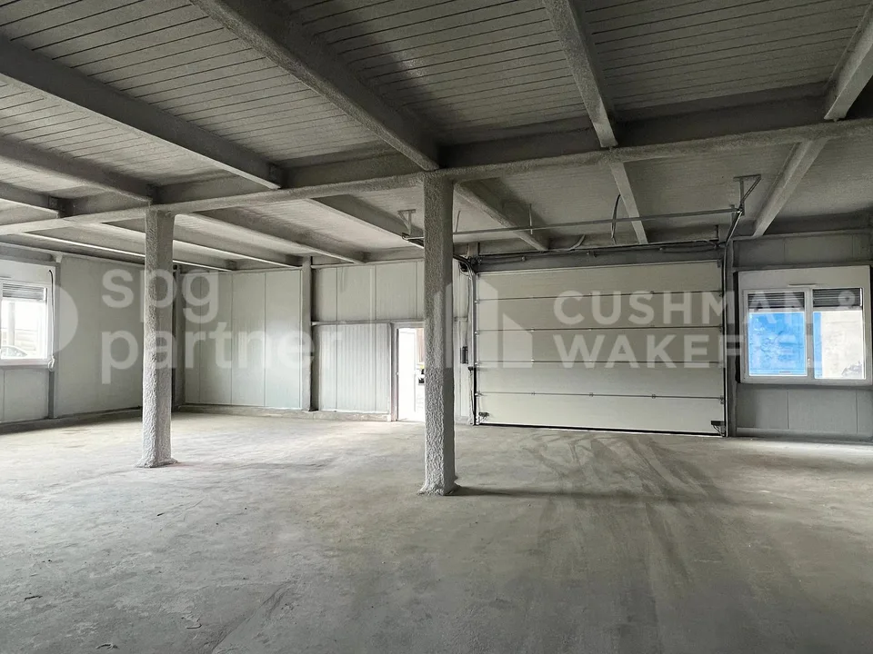 Atelier / deposito al piano terra di 300 m² nella zona industriale di Satigny