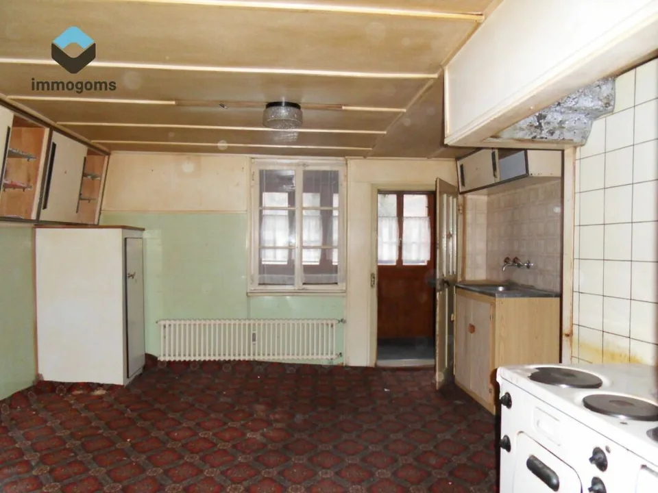 Casa con tre appartamenti in una posizione centrale