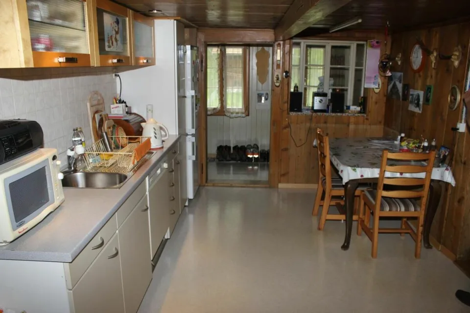 Casa a 2 famiglie con laboratorio e parcelle di terreno edificabile