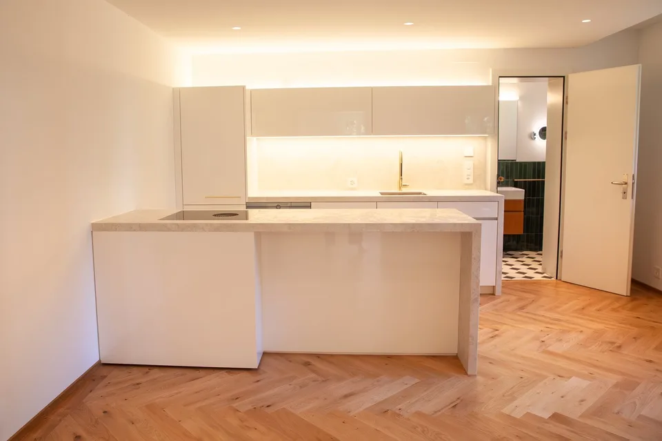 Erstvermietung: Repräsentative 3 ½-Zimmerwohnung mit eigenem Garten in historischer Zürichbergvilla